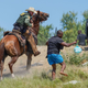 A United States Border Patrol agent on horseback uses the reins to try and stop a Haitian migrant from entering an encampment on the banks of the Rio Grande near the Acuna Del Rio International Bridge in Del Rio, Texas on September 19, 2021.